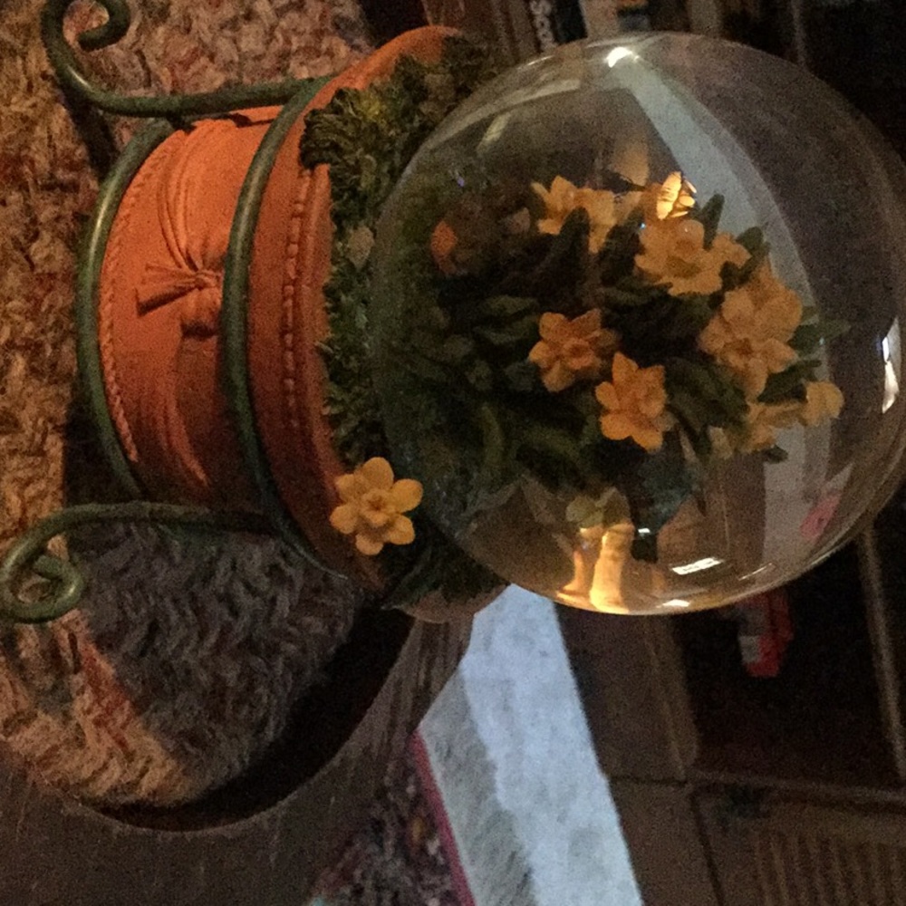 Vintage music box and glitter globe with flowers